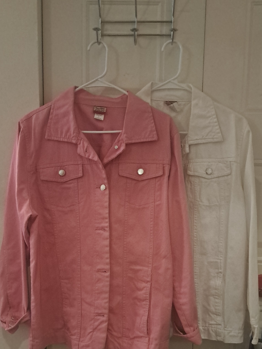 2 Denim jackets, 1 pink-1 white. Tudor Court size large